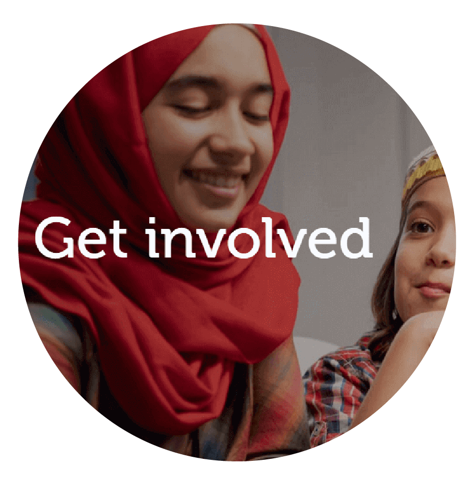 lady wearing a scarf smiling