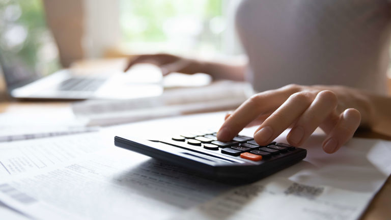 a person using a calculator