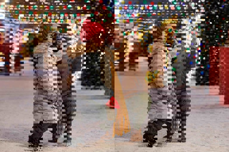 father taking a festive selfie with his daughter