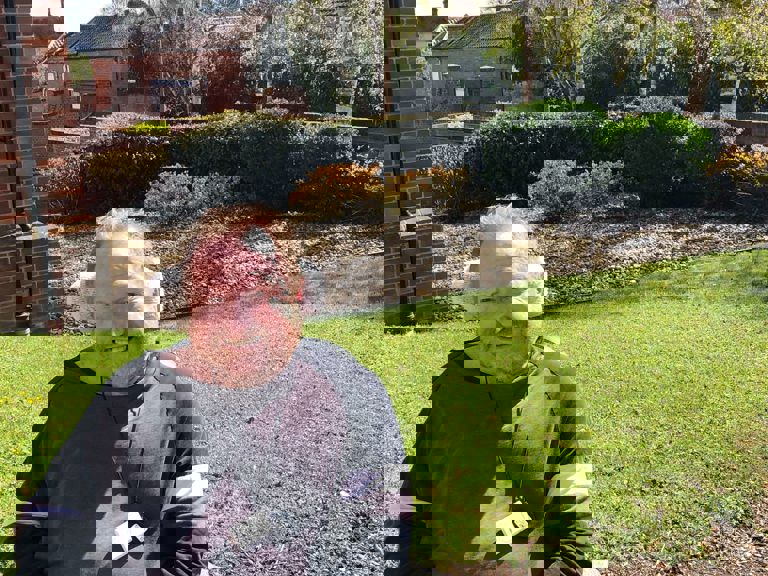 man sitting in a garden